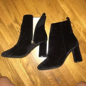 Black velvet heeled boots